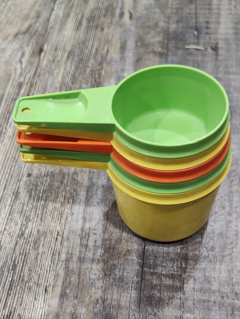 Tupperware Set Of Five Nesting Measuring Cups, Yellow, Green, Orange
